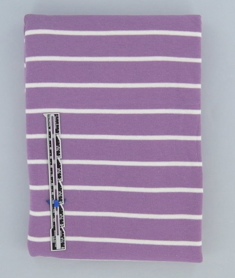 May include: Purple and white striped fabric with a white stripe approximately every 1/2 inch.