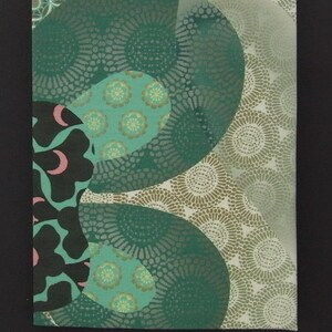 May include: A green and brown fabric with a repeating pattern of circles and flowers. The fabric has a textured surface and a subtle sheen.