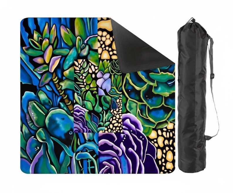 May include: A yoga mat with a vibrant, colorful succulent design in shades of blue, green, purple, and yellow. The mat is rolled out, with a black underside visible. A black carrying bag with a shoulder strap is next to the mat.