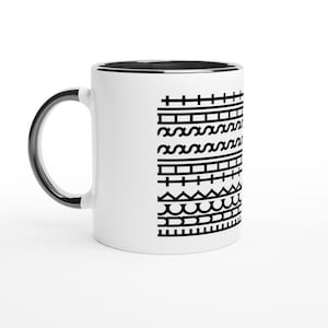 May include: White ceramic mug with a black interior and handle. The mug features a repeating black geometric pattern on the exterior. The design includes horizontal lines, zigzags, and other shapes. A simple and modern design for everyday use.