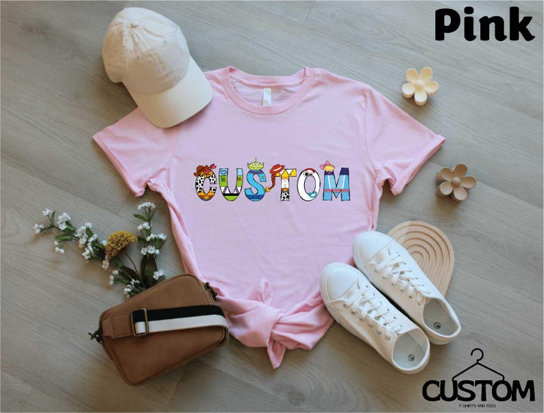 a pink shirt with the word autism on it