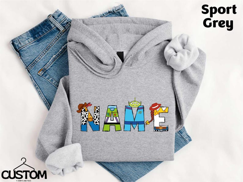 a gray hoodie with the word game printed on it