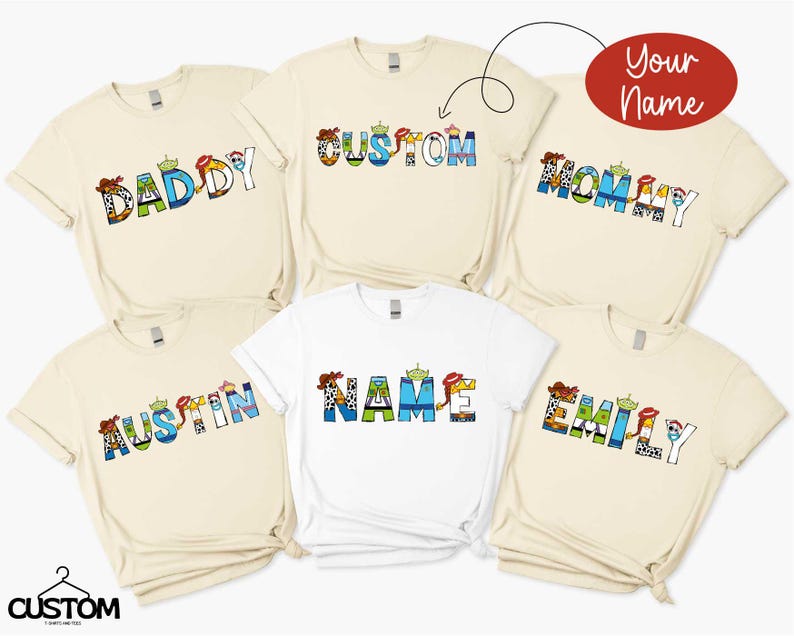 a group of t - shirts with the word family printed on them