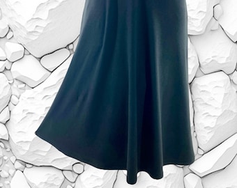 Black below-the-knee-length skirt in bamboo/cotton/spandex knit with soft waistband.