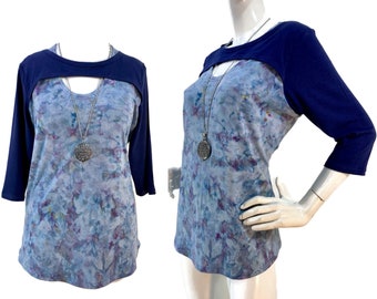 Blue tie dye bamboo top with 3/4 sleeves and double neckline detail.