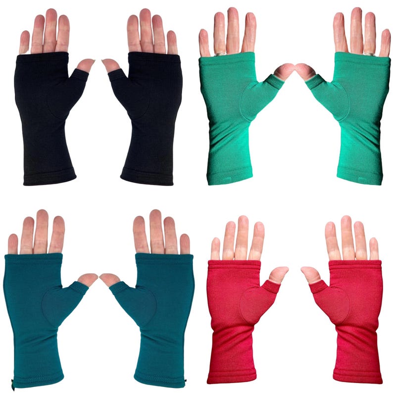May include: Four pairs of fingerless compression gloves in black, bright green, teal, and red. Each pair features a thumb hole and covers the palm and wrist area, leaving the fingers exposed. The fabric appears smooth and solid in color.