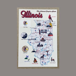 May include: A map of Illinois with illustrations of the state's symbols, including the state bird, flag, flower, and butterfly. The word "Illinois" is written in a decorative font at the top, with the phrase "The Inland Empire State" above the map.
