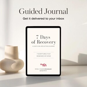 May include: A digital tablet displays the text "7 Days of Recovery" and "A God's Girl Reflection Journal." The image also includes the text "7 Scriptures That Renewed My Mind" and "God's Girl." A beige vase is on the left.