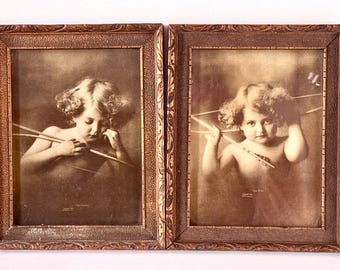 Antiek ingelijst schilderij uit 1897: Cupido wakker en Cupido slapend van M.B. Parkinson