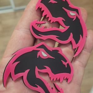 T Rex lastbilsemblempar: Svarta och rosa akryl dinosauriemärken