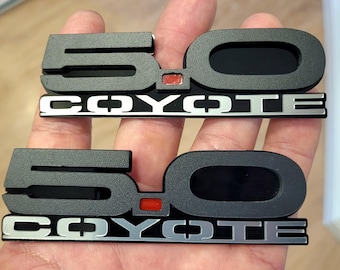 Coyote Badge Emblem Pair: Stealth Black with Red Accent for 5.0 Mustang Fender