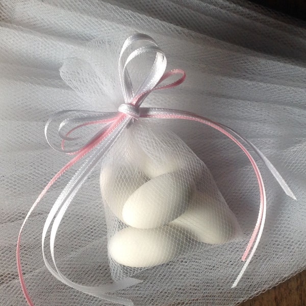 A set of 50 white, small, tulle wedding favour bags