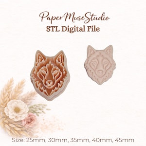 May include: A digital STL file from Paper Muse Studio featuring a wolf head design. The image displays two views of the wolf head, one showing the structural cutter form and one showing the embossed impression. Sizes include 25mm, 30mm, 35mm, 40mm, and 45mm.
