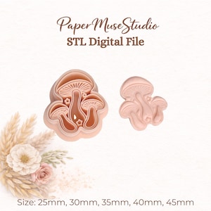 May include: A light peach-colored mushroom-shaped cookie cutter and a matching stamp, labeled Paper Muse Studio STL Digital File. The set includes sizes 25mm, 30mm, 35mm, 40mm, and 45mm. The design features three mushrooms with small star accents.