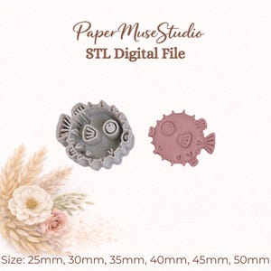 May include: A gray pufferfish-shaped cookie cutter and a matching pink pufferfish-shaped cookie, labeled PaperMuseStudio STL Digital File. The text indicates available sizes of 25mm, 30mm, 35mm, 40mm, 45mm, and 50mm for this digital product.
