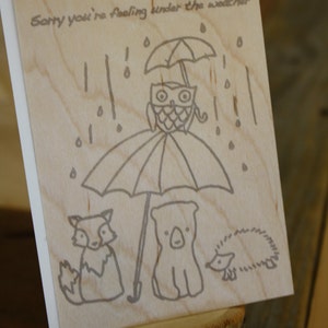 Letterpress Forest vrienden onder de weerkaart op hout