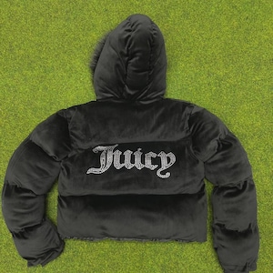 May include: Black velvet puffer jacket with a hood and the word "Juicy" spelled out in rhinestones across the back. The jacket has a plush, quilted design and a faux fur trim around the hood.