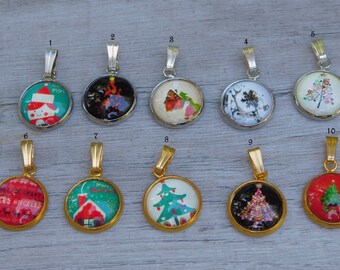 May include: Ten round pendants with silver or gold-toned metal bails, each featuring a unique holiday-themed graphic insert. The designs include Christmas trees, festive houses, Santa figures, and winter scenes, numbered one through ten.