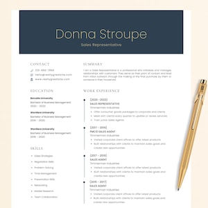 May include: A resume for Donna Stroupe, a Sales Representative, with contact information, education, skills, and work experience. A gold pen rests on the right side of the resume. The resume is on a white background with a navy blue header.