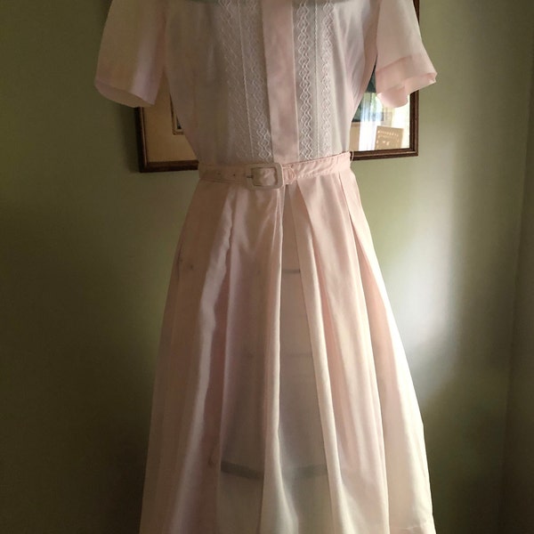 1950s pastel pink shirtwaist dress with scalloped collar and embroidery