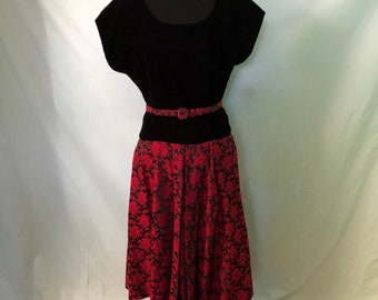 1950s party dress with black velvet bodice and red brocade skirt