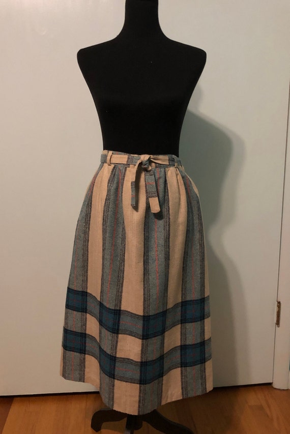 Early 1960s striped wool skirt with plaid hemline