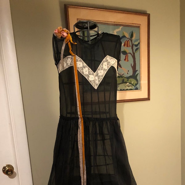 1920s black organdy dress with ribbons, lace, and corsage