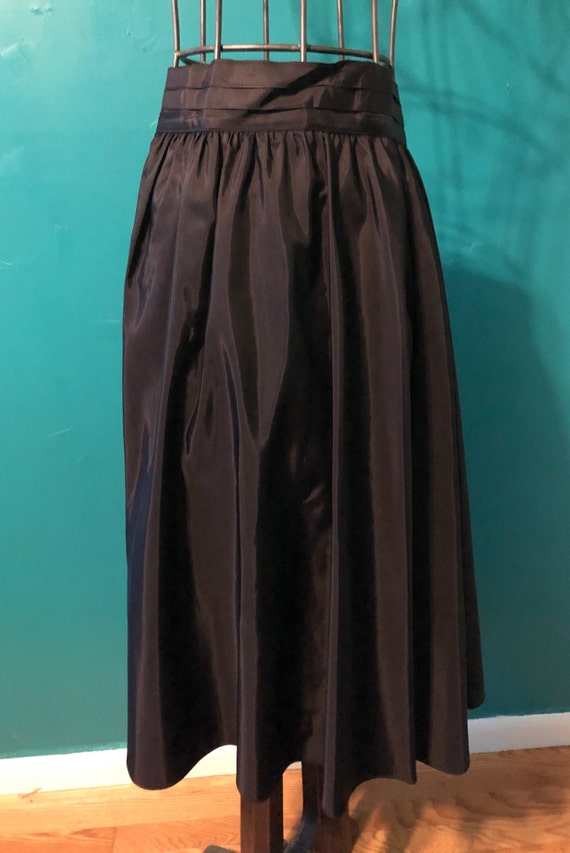 1970s Jessica’s Gunnes black matte satin skirt