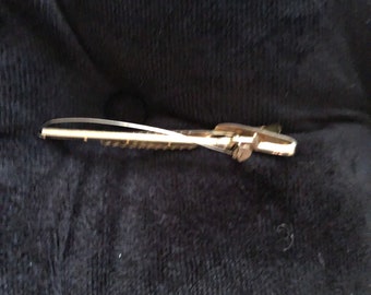 1950s Hicock fishing pole tie clip