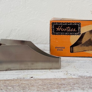 May include: A white ceramic mug with a black handle and the text "But First, Coffee" in a handwritten style. The mug is likely 12 ounces in capacity, perfect for a morning beverage.