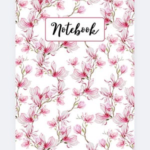 May include: A notebook with a white background covered in a pattern of pink and white magnolia flowers. The word "Notebook" is written in black script inside a rectangular frame.