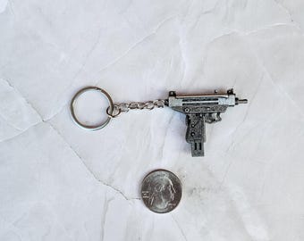 Llavero réplica de arma Uzi, regalo personal o de cumpleaños