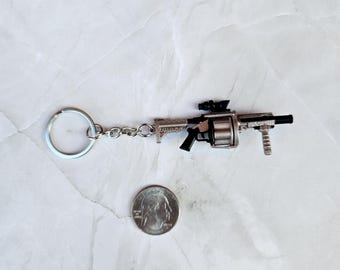 Llavero réplica de arma Milkor, lanzagranadas múltiple, regalo personal o de cumpleaños.