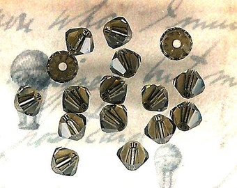 Paquete de 16 piezas de cristales de Swarovski de cuarzo ahumado de 4 mm, Swarovski marrón gris, cristal de Swarovski de 4 mm, cuentas de cuarzo ahumado, cuentas de bicono marrón gris