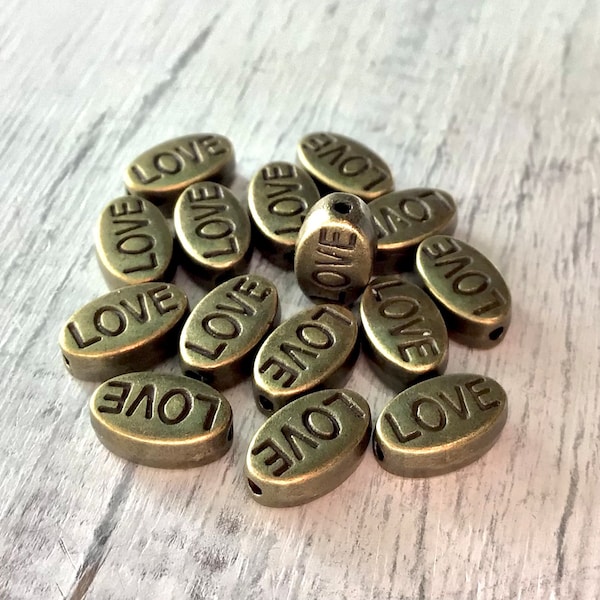 10mm Antique Brass Plated Love Beads, 15 PC Pack, 10mm Brass Oval, 10mm Love, Word Bead, 10mm Antique Brass Oval Bead, Julie's Bead Store