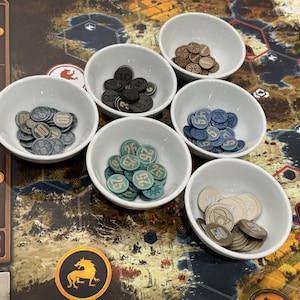 A board game background with various generic 3D board game coins. These generic coins can be used for many games such as Scythe, Ark Nova or Brass Birmingham.