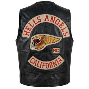 May include: A white ceramic mug with a black handle and the text "But First, Coffee" in a black, handwritten-style font. The mug is on a white surface.