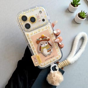 Broderat iPhone-skal med kanin – Gult blommande konstläderfodral, plyschrem