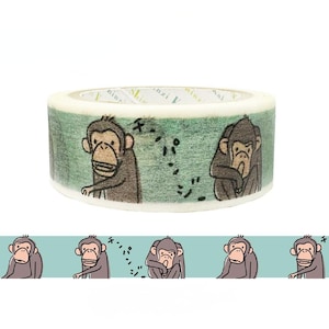 May include: Washi tape roll with a repeating pattern of cartoon monkeys on a light green background. The monkeys are depicted in various poses and shades of brown and tan. The tape roll is white with a green design.