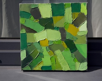 May include: Square abstract painting with a palette of greens and yellows. The artwork features textured brushstrokes, creating a patchwork effect. The shades range from light to dark, with a focus on the interplay of color and texture.