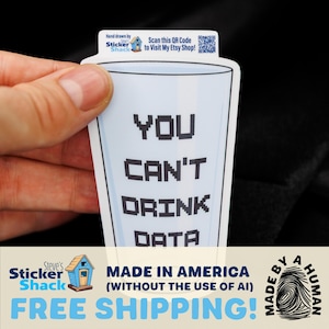May include: A die-cut sticker shaped like a drinking glass with a light blue tint. The text in black pixelated font reads YOU CAN'T DRINK DATA. A small tab at the top includes a QR code and the text Hand drawn by Steve's Sticker Shack.