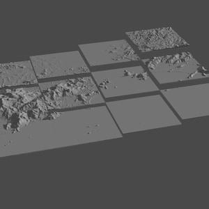 May include: A collection of gray, textured, square tiles, each displaying a different topographical landscape. The tiles are arranged in a grid, showcasing various terrains, including mountains, plains, and valleys. The image is a top-down view.