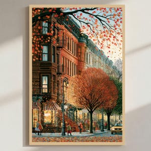 May include: A vertical art print depicting a city street in autumn with brownstone buildings, orange and red foliage, and falling leaves. A yellow taxi is parked on the street, and several figures walk along the sidewalk near a storefront.