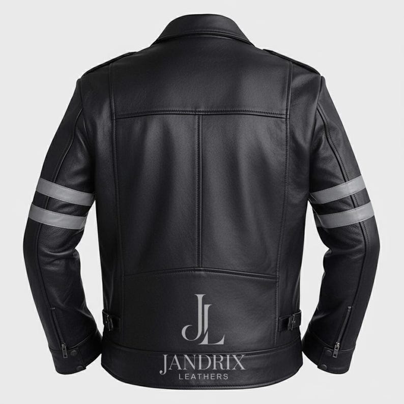 May include: Black leather jacket with silver stripes on the sleeves. The jacket has a classic biker style with a notched collar, zipper pockets, and a belt at the waist. The brand name "Jandrix Leathers" is printed at the bottom.