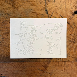Postal con mapa del estado de Oregón impresa en tipografía