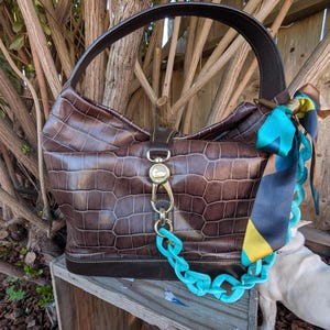 Dooney and Bourkec Logo Loc Sac