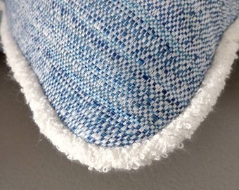 Indoor Outdoor Pillow cover of woven shades of blue with a terry welt. APPROX 20X20"