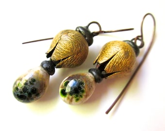 The Squeaks and Grunts of the Avant Garde - primitive pine green cream lampwork glass orbs, retro brass bead cap, tinned metal earrings