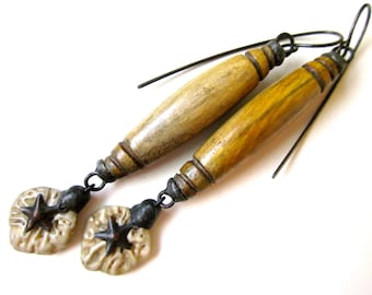The Only Thing That Lasts - long assemblage tribal fossilzed sand dollar chip, star charm, vintage wood bead, & soldered black metal earring
