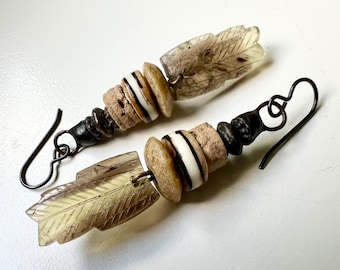 Old Sins Have a Long Shadow - primitive tribal assemblage carved stone feather, trade beads, crinoid fossil soldered stacked earrings